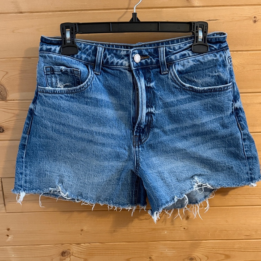 High-Rise Distressed Vervet Denim Shorts - Blue
Sz L